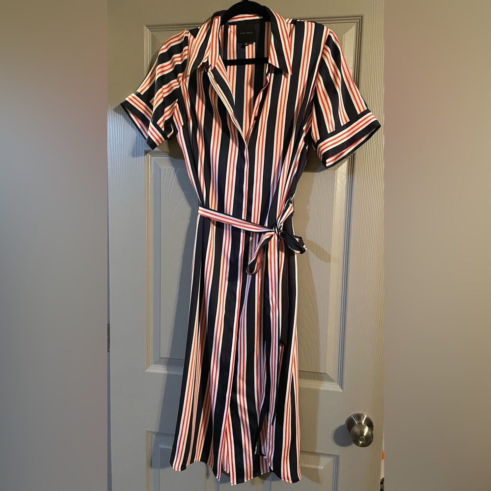 Stylish Alex Marie size 10 button up dress. Navy/red. Never worn from Dillards.